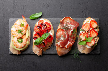 Appetizers plate with traditional spanish tapas set. Italian antipasti brushetta snacks