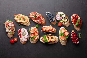 Appetizers plate with traditional spanish tapas set. Italian antipasti brushetta snacks