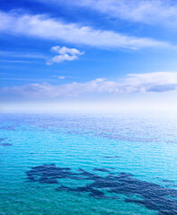 Obraz premium Sea beach blue sky sand sun daylight relaxation landscape viewpoint for design postcard and calendar in Crete, Greece,