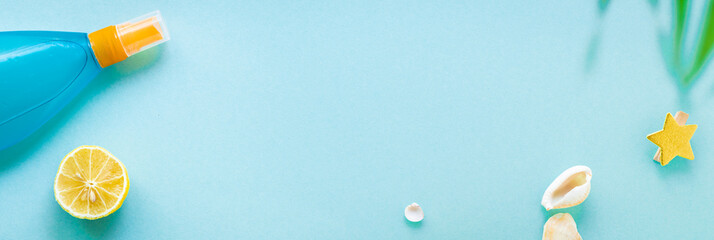 tropical leaf beach accessories travel vacation Summer background ocean sea, summer sunscreen bottle of lotion, sun glasses, seashells, lemon positive relax  mood top view