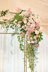 Lush floral arrangement of white and pink fresh flowers
