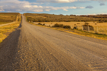 Gravel road on the pampas in south Chile Patagonia