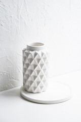 White home decoration with ceramic vase on tray, minimalistic interior decor objects