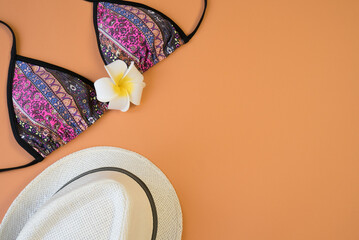 Shorts, sunglasses, swimsuit, plumeria flower, summer vacation concept. Summer entertainment...