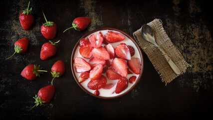 Strawberries with cream bowl. Summer dessert.