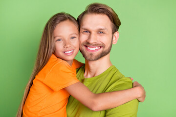 Portrait of attractive cheerful people dad daddy embracing spending time isolated over green color background