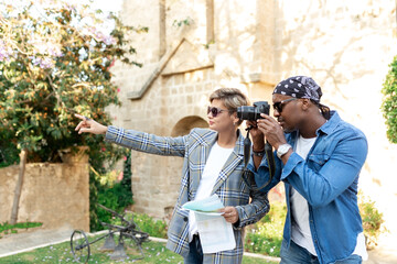 Multicultural african and latin couple enjoing traveling together .middle age mixed race, multi-ethnic couple on vacation in Europe