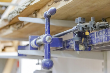 Mechanical working tool in a carpentry workshop. Manual production of wood and precious woods...