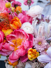Closeup very beautiful and unusual bouquet with pink peonies. bright work of the florist