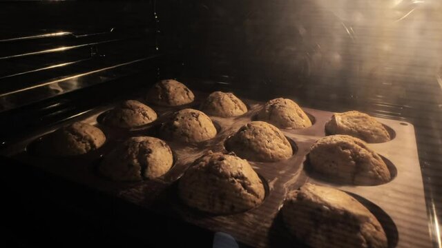 muffin cookies - time lapse baking cookies in the oven, the dough rises. 4K video, inside the oven