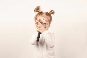 Little cute girl on the light background