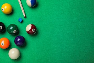 Flat lay composition with balls on billiard table, space for text - obrazy, fototapety, plakaty