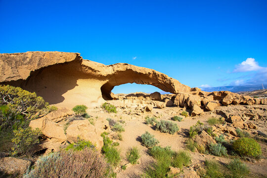 Arco de Tajao , famous rock arch in south of  Tenerife Canary Islands. This attractive natural bridge of volcanic origin  has a total of 30 meters in length.