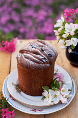 Easter cake in flowers. Side view.