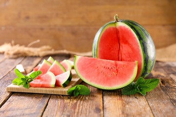 fresh watermelon on wood background
