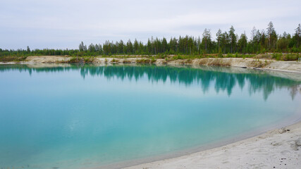 nature landscape summer spring blue clear lake forest in the distance