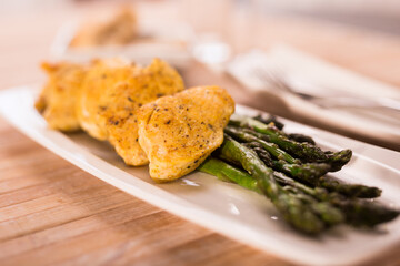 dietary meal rich in protein. Stir fried chicken breast and green asparagus