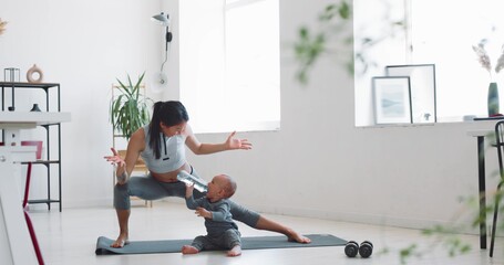 Mom and child do fitness at home during isolation - Powered by Adobe