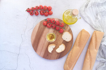 slice of whole meal bread and olive oil on table 