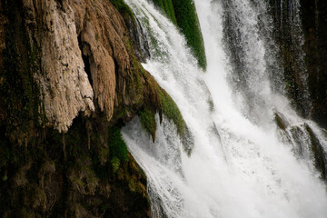 Fototapeta premium Close-up view of splashing water of Duden waterfall in Antalya, Turkey at sunny day