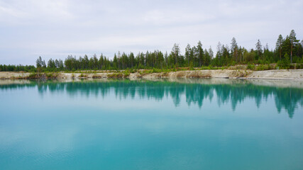 nature landscape summer spring blue clear lake forest in the distance