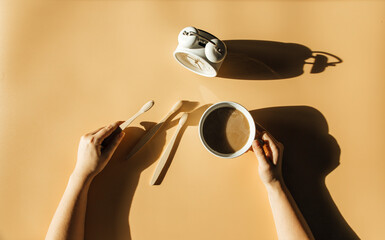 bamboo brushes in the hands of the girl. Waste-free spa. Eco-friendly bathroom accessories