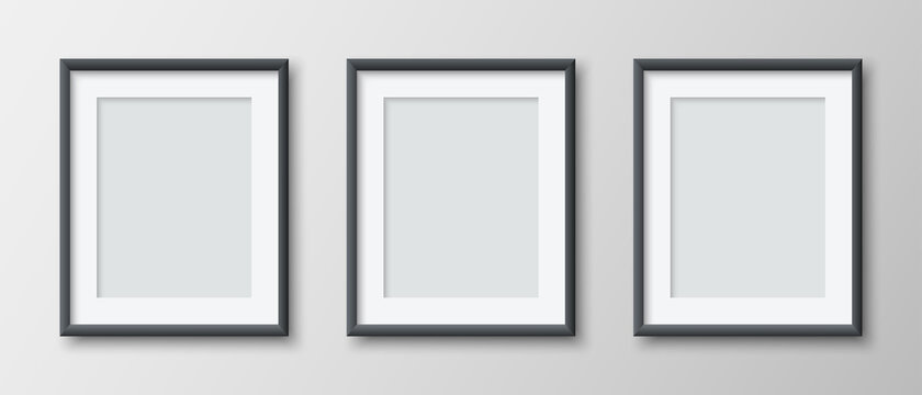 Realistic set of three vertical blank picture frame isolated on grey wall background. Empty photo frames set mockup for pictures, photograph, poster. Decorative design element interior. Vector