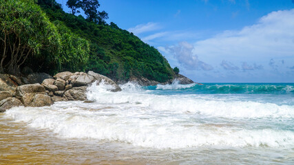Fototapeta na wymiar Waves on Nai Harn Beach on Phuket Island in Thailand