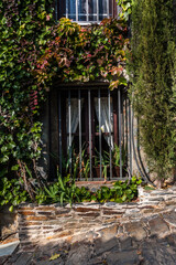 Lattice window of a stone house