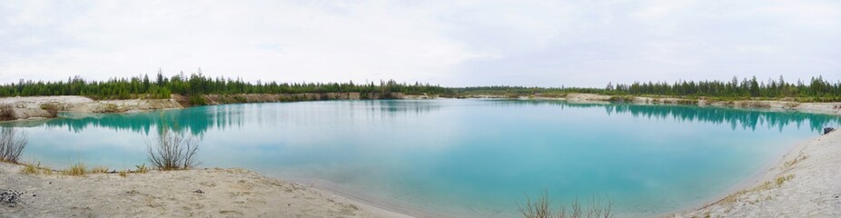 nature landscape summer spring blue clear lake forest in the distance                                panorama  