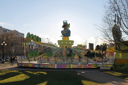 Backlit fair attraction during a winter afternoon in León (Spain) - Powered by Adobe
