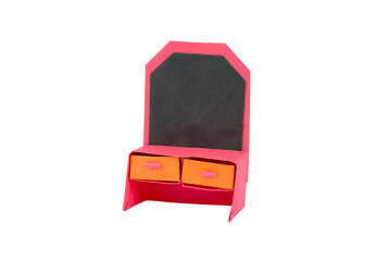 A desk made with small craft paper and nicely placed on a paper background