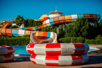 Multi-colored water slides and a pool at the water park. Egypt. Makadi