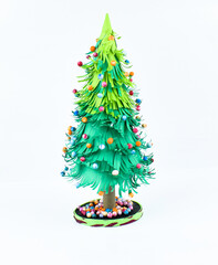 A tree made with small craft paper and nicely placed on a paper background