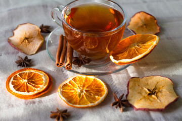 Cup of tea and slices of dried orange