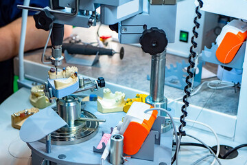 Workplace equipment dental technician. Production of dental crowns or jaws. Drilling dental unit. Drilling machine for creating artificial jaw. Prosthetic dentistry. Sale of equipment for dentist.