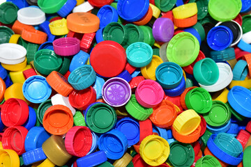 Plastic bottle caps for recycling. Cap material of plastic recyclable materials for recycling and reuse. Exchanging garbage for money. Reduse garbage and waste from polypropylene and polyethylene