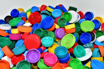 Plastic bottle caps for recycling. Cap material of plastic recyclable materials for recycling and reuse. Exchanging garbage for money. Reduse garbage and waste from polypropylene and polyethylene