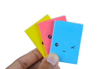 Couple of book made with small craft paper and nicely placed on a paper background