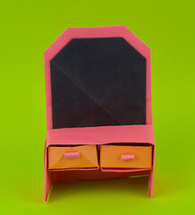 Couple of desk made with small craft paper and nicely placed on a paper background