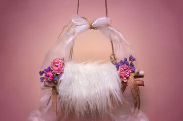 baby photophone, cot, hanging, covered with white fur