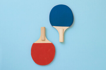 Red and blue wooden pingpong paddels, pingpong rackets