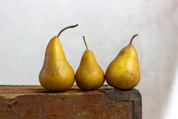 minimalist still life with pears on a white background