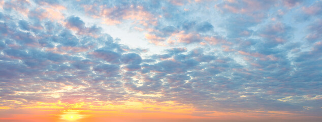 Naklejka na ściany i meble Delicate Panorama of Sunset Sunrise Sundown Sky with colorful clouds