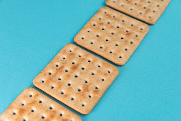 Salt crackers on the blue background
