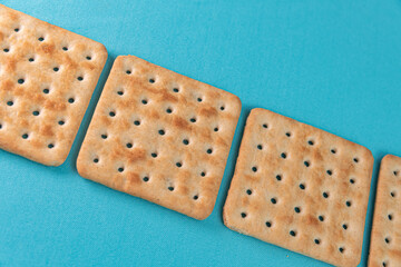 Salt crackers on the blue background