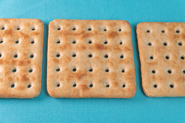 Salt crackers on the blue background