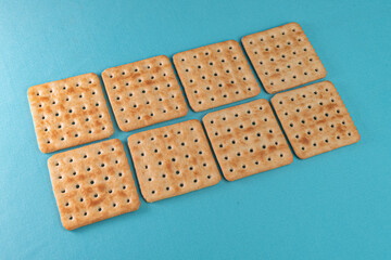 Salt crackers on the blue background
