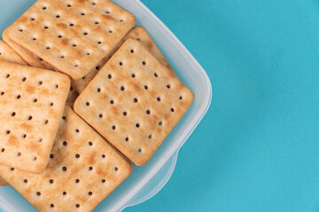 Salt crackers on the blue background