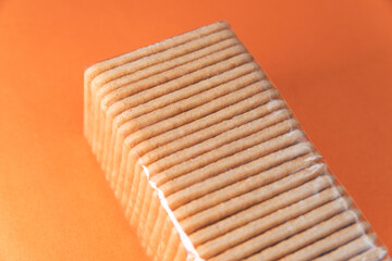 Salt crackers on the orange background